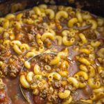 A comforting and hearty soup with beef, tomato broth, and tender macaroni, perfect for quick weeknight dinners or cozy meals.