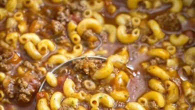 A comforting and hearty soup with beef, tomato broth, and tender macaroni, perfect for quick weeknight dinners or cozy meals.