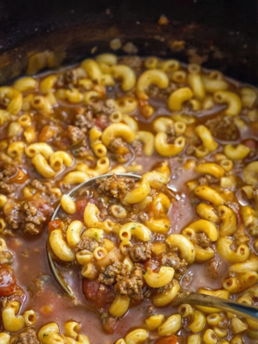 A comforting and hearty soup with beef, tomato broth, and tender macaroni, perfect for quick weeknight dinners or cozy meals.
