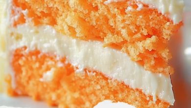 A light and refreshing citrus cake with creamy orange frosting, perfect for any occasion.