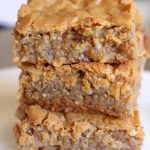 Rich and chewy dessert bars made with caramelized butter and sweet coconut flakes. Perfect for any occasion!