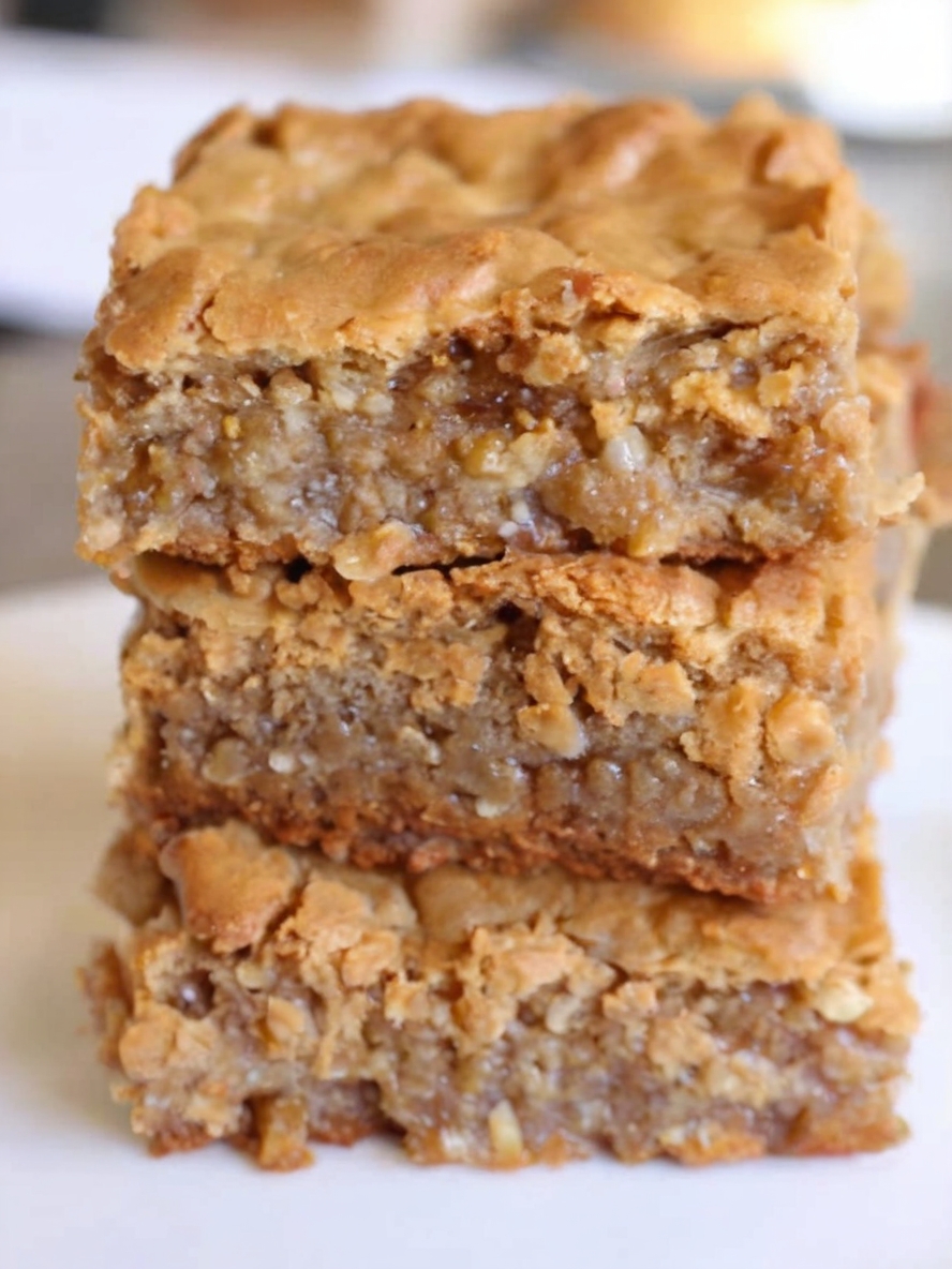 Rich and chewy dessert bars made with caramelized butter and sweet coconut flakes. Perfect for any occasion!