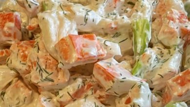 A creamy and refreshing seafood salad with imitation crab, celery, and a tangy dill dressing, perfect for summer gatherings or light lunches.