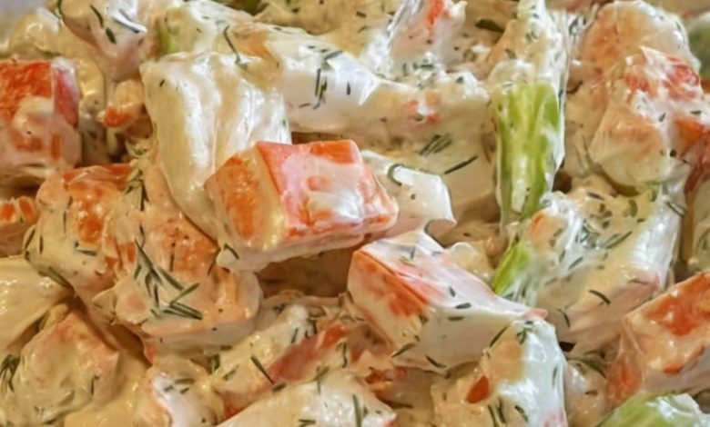 A creamy and refreshing seafood salad with imitation crab, celery, and a tangy dill dressing, perfect for summer gatherings or light lunches.